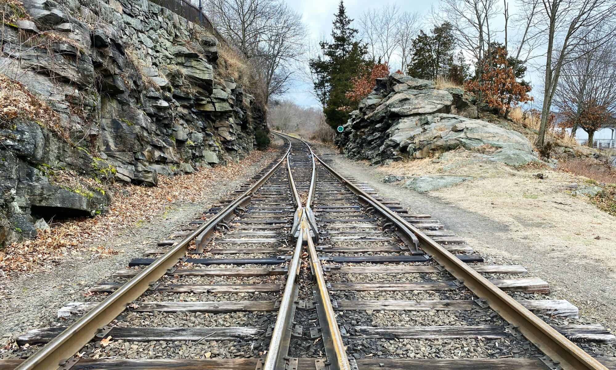train tracks legal mergers